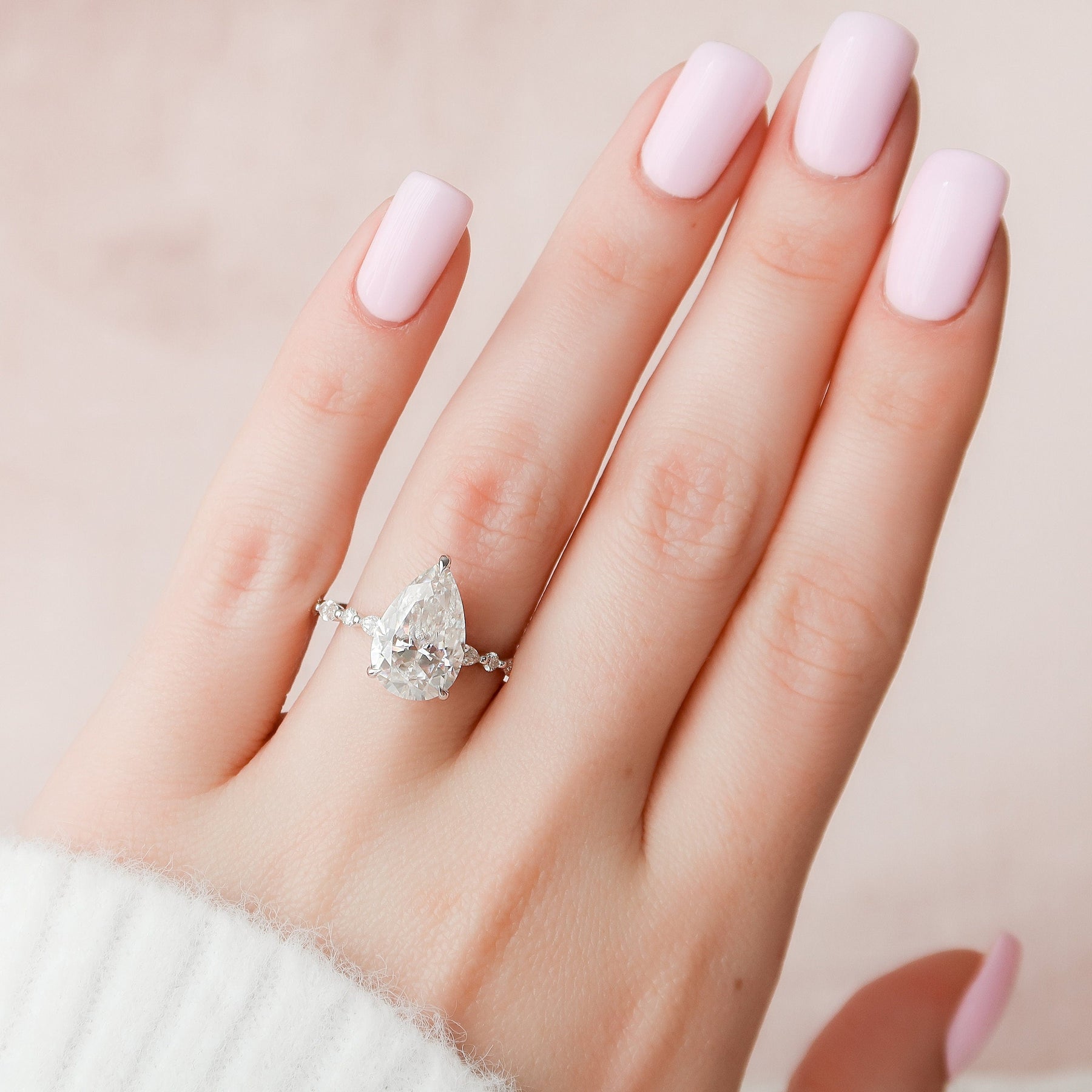 Scholarly Pear Diamond Wedding Ring