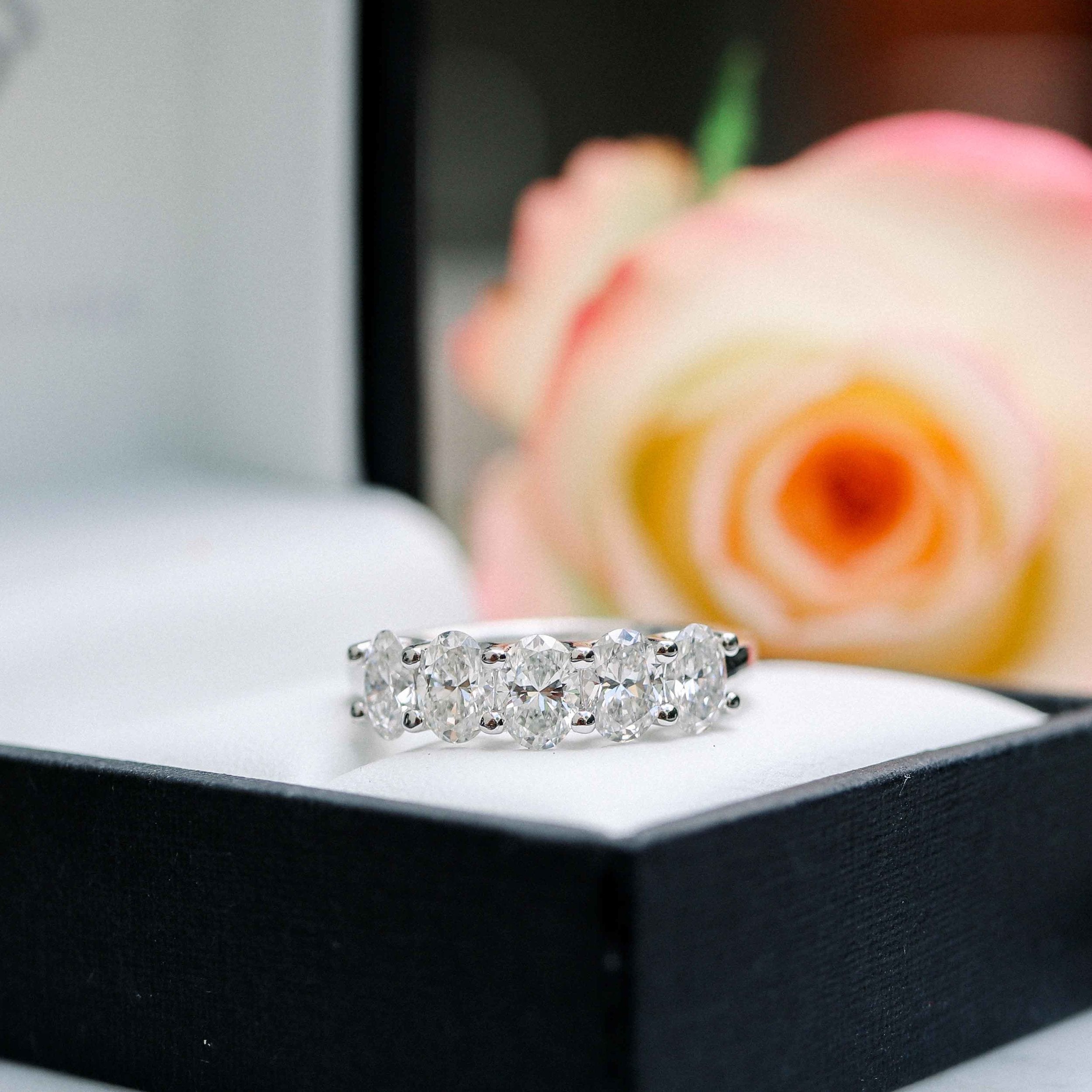 Stately Oval Cut Diamond Band