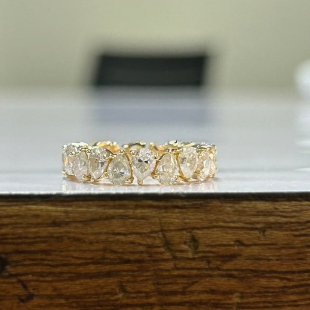 Charismatic Pear Cut Diamond Band