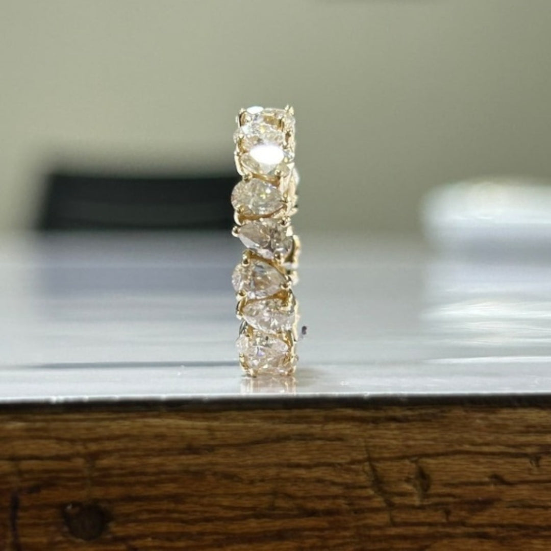 Charismatic Pear Cut Diamond Band