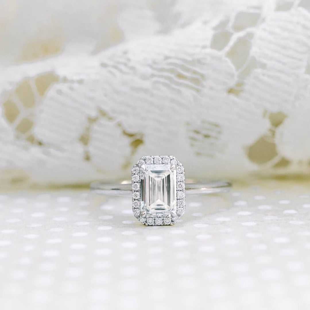 Cunning Emerald Shape Diamond Wedding Ring