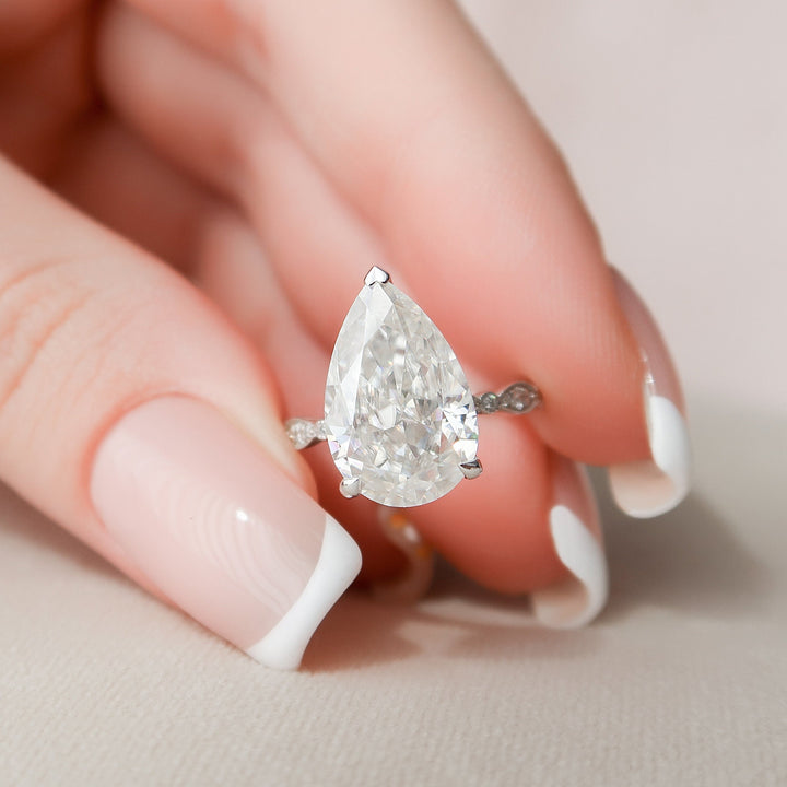 Ostentation Pear Diamond Wedding Ring