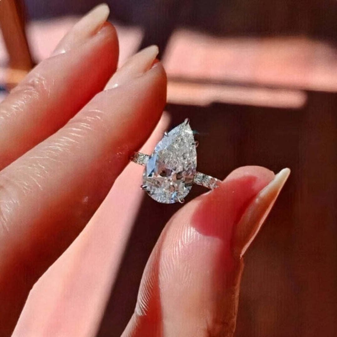 Fetching Pear Shape Diamond Wedding Ring